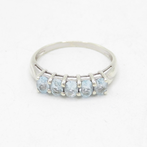 72 - 9ct gold blue topaz eternity ring (1.8g) Size  P