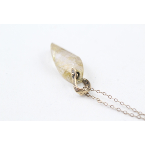 23 - 9ct gold rutilated quartz and diamond pendant with 9ct gold chain (3.6g)