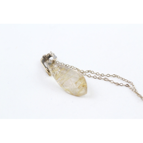 23 - 9ct gold rutilated quartz and diamond pendant with 9ct gold chain (3.6g)