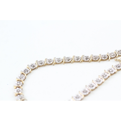 31 - 9ct gold diamond tennis bracelet (5g)