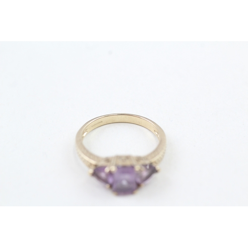 35 - 9ct gold amethyst trilogy dress ring (2.7g) Size  O