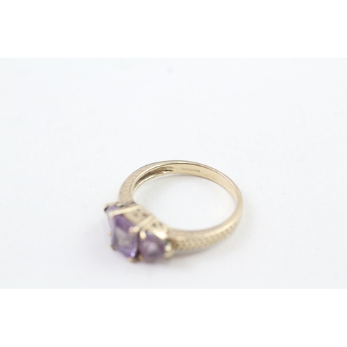 35 - 9ct gold amethyst trilogy dress ring (2.7g) Size  O