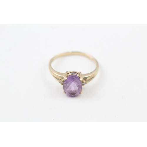 36 - 9ct gold oval cut amethyst solitaire dress ring with diamond set shoulders (2g) Size  N