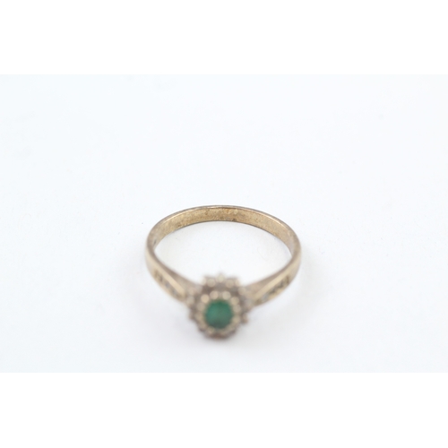 39 - 9ct gold vintage emerald and diamond halo dress ring with diamond set shoulders (3.1g) Size  P