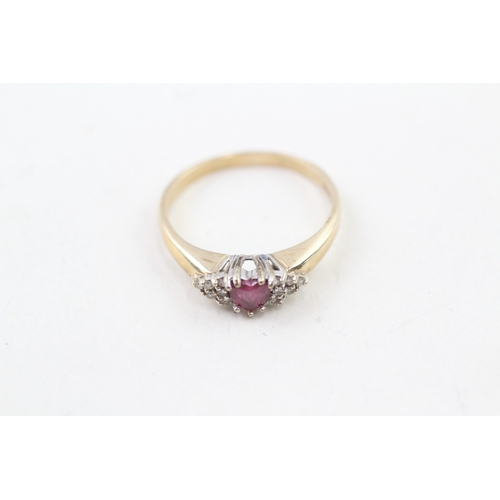 48 - 9ct gold heart cut ruby dress ring with diamond set shoulders (2.6g) Size  P