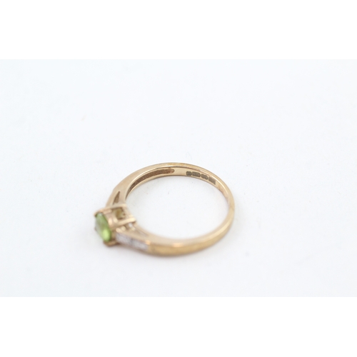 49 - 9ct gold peridot solitaire dress ring with diamond set shoulders (1.6g) Size  L