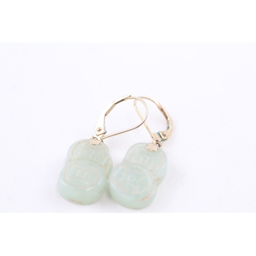 54 - 14ct gold carved jade drop earrings with leverbacks (5.4g)