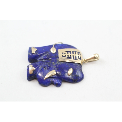 55 - 14ct gold carved lapis lazuli elephant pendant (5.7g)