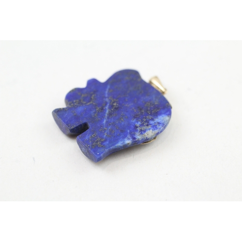 55 - 14ct gold carved lapis lazuli elephant pendant (5.7g)