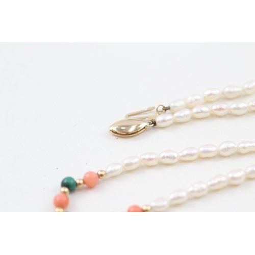 56 - 14ct gold clasped rice pearl, malachite and coral necklace with 14ct gold beads (8g)