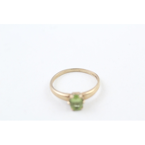 60 - 9ct gold oval cut peridot solitaire dress ring (1.5g) Size  N