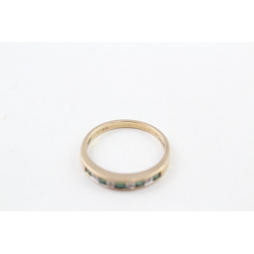 63 - 9ct gold channel set emerald and diamond half eternity dress ring (1.8g) Size  N