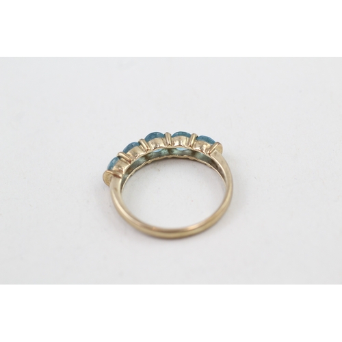 64 - 9ct gold bar set blue topaz five stone dress ring (2.1g) Size  O