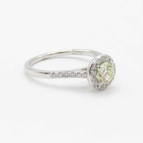 1 - Platinum Diamond Halo Ring - Set with a yellow natural earth mined diamond (0.50ct) with a hallmarke... 