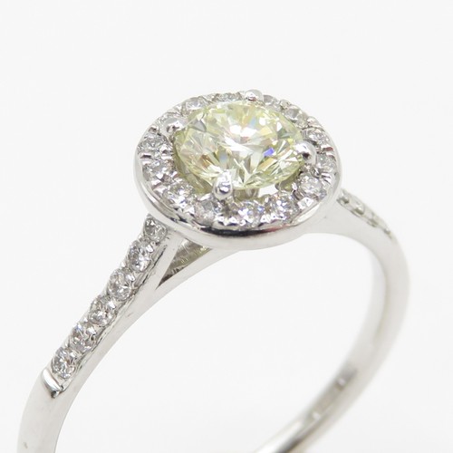 1 - Platinum Diamond Halo Ring - Set with a yellow natural earth mined diamond (0.50ct) with a hallmarke... 