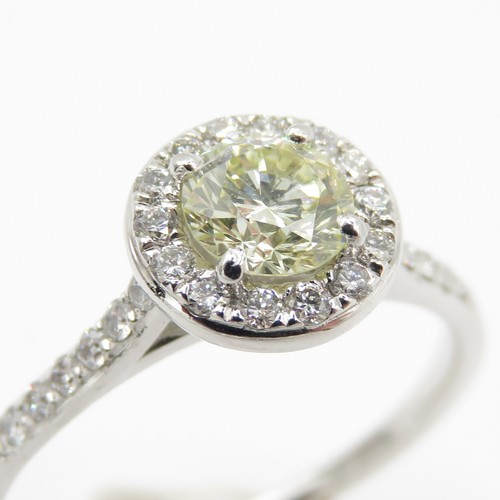 1 - Platinum Diamond Halo Ring - Set with a yellow natural earth mined diamond (0.50ct) with a hallmarke... 