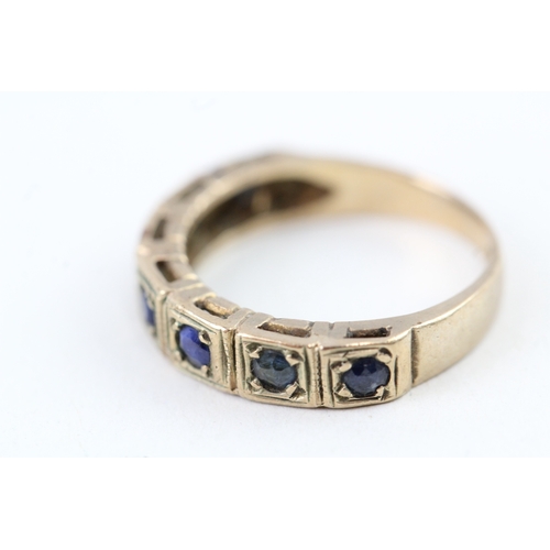 101 - 9ct gold sapphire half eternity ring (2.1g) Size  I 1/2