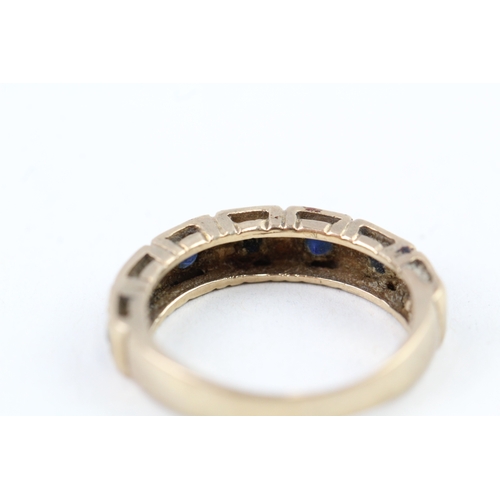 101 - 9ct gold sapphire half eternity ring (2.1g) Size  I 1/2