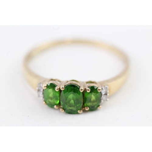 103 - 9ct gold oval cut diopside & diamond dress ring (1.5g) Size  P