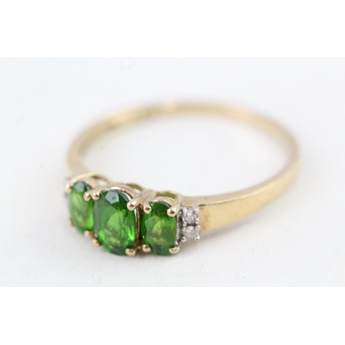 103 - 9ct gold oval cut diopside & diamond dress ring (1.5g) Size  P