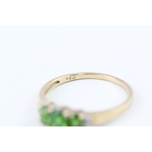 103 - 9ct gold oval cut diopside & diamond dress ring (1.5g) Size  P