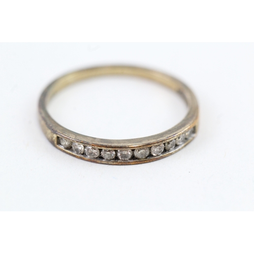 107 - 9ct gold diamond half eternity ring, total diamond weight: 0.25ct (approximately) (1.6g) Size  P