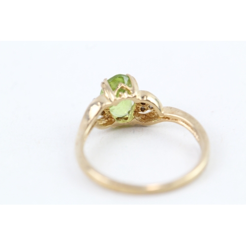 109 - 9ct gold peridot & diamond dress ring (1.6g) Size  J