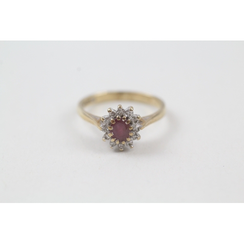 11 - 9ct gold ruby and diamond halo dress ring (1.7g) Size  J