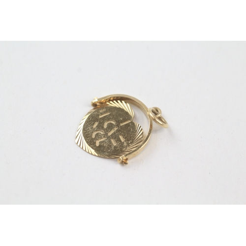 128 - 9ct gold vintage 'I love you' spinner charm (1.2g)