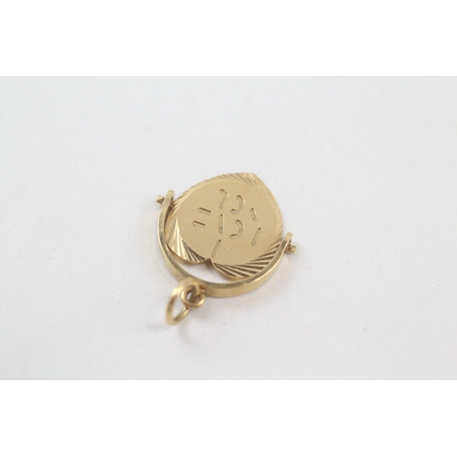 128 - 9ct gold vintage 'I love you' spinner charm (1.2g)