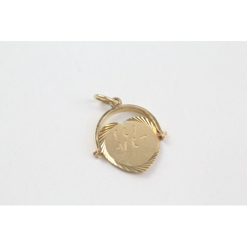 128 - 9ct gold vintage 'I love you' spinner charm (1.2g)