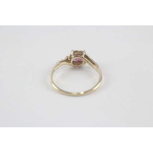 130 - 10ct gold purple garnet & diamond dress ring (1.7g) Size  N 1/2