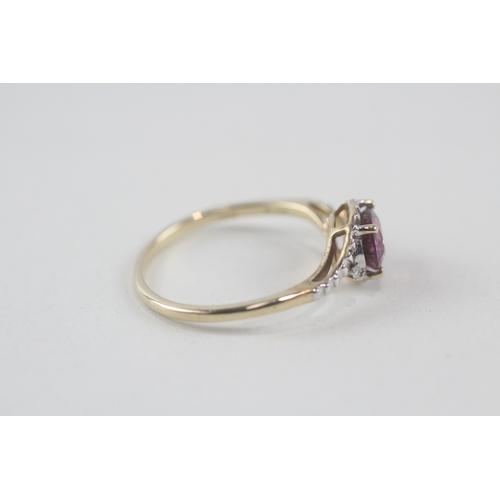 130 - 10ct gold purple garnet & diamond dress ring (1.7g) Size  N 1/2