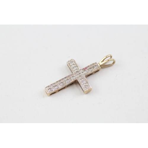 138 - 9ct gold diamond set cross earrings & pendant (1.8g)