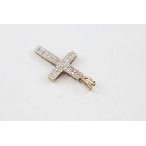 138 - 9ct gold diamond set cross earrings & pendant (1.8g)