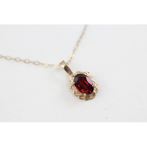 139 - 9ct gold garnet set earrings & necklace matching set (2.1g)