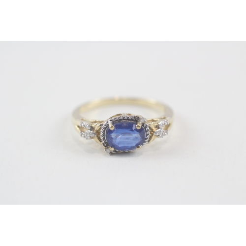 141 - 9ct gold oval cut kyanite & diamond dress ring (2.8g) Size  Q