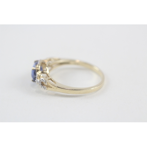 141 - 9ct gold oval cut kyanite & diamond dress ring (2.8g) Size  Q