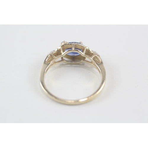 141 - 9ct gold oval cut kyanite & diamond dress ring (2.8g) Size  Q