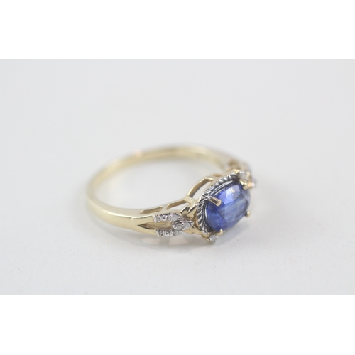 141 - 9ct gold oval cut kyanite & diamond dress ring (2.8g) Size  Q