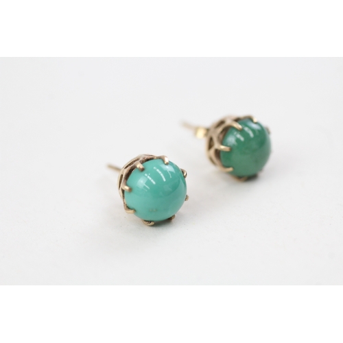 142 - 9ct gold cabochon cut turquoise stud earrings with scroll backs (1.9g)