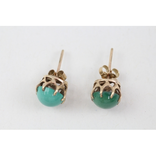 142 - 9ct gold cabochon cut turquoise stud earrings with scroll backs (1.9g)