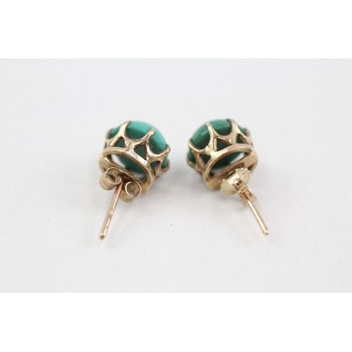 142 - 9ct gold cabochon cut turquoise stud earrings with scroll backs (1.9g)