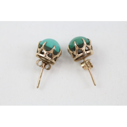 142 - 9ct gold cabochon cut turquoise stud earrings with scroll backs (1.9g)