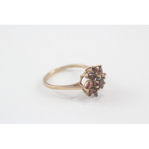 144 - 9ct gold garnet dress ring (2.6g) Size  N