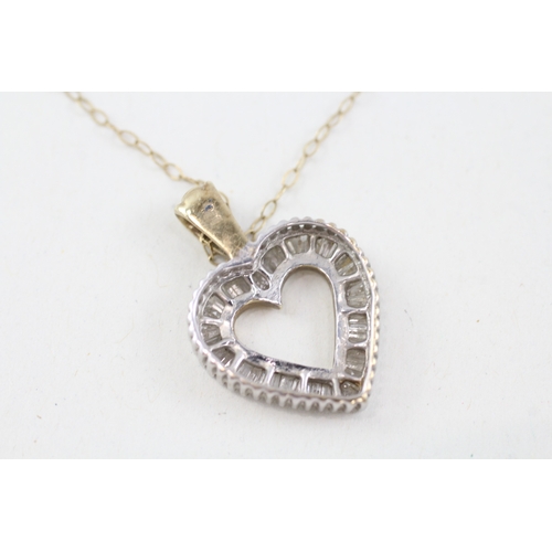 148 - 9ct gold baguette cut diamond heart shape pendant necklace (2.6g)