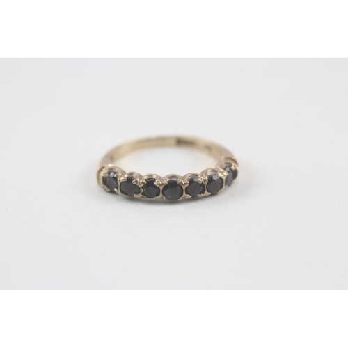 173 - 9ct gold sapphire half eternity ring (2.3g) Size  K 1/2