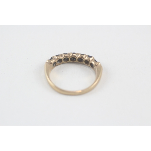 173 - 9ct gold sapphire half eternity ring (2.3g) Size  K 1/2