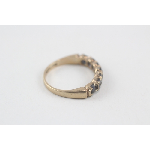 173 - 9ct gold sapphire half eternity ring (2.3g) Size  K 1/2