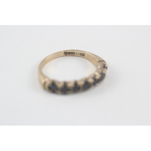 173 - 9ct gold sapphire half eternity ring (2.3g) Size  K 1/2